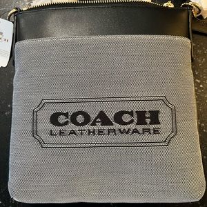 Brand new (w/ tag attached) small Coach cross body bag